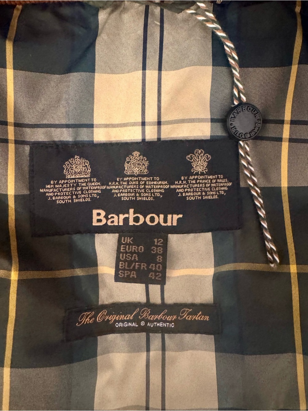 Women’s Barbour Quilted Jacket featuring iconic lining.